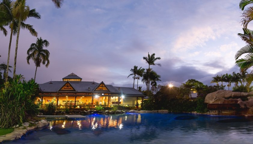 The first thing I noticed as I entered the resort was the contrast: the manicured lawns, orderly colonial buildings, and the looming, vibrant rainforest that seemed to hold its breath at the resort's edge. I couldn't help but admire how it blended modern amenities with a raw, primal setting. It was like a sanctuary in the heart of the wild, held at bay by unseen forces.Cairns Colonia Club Pool